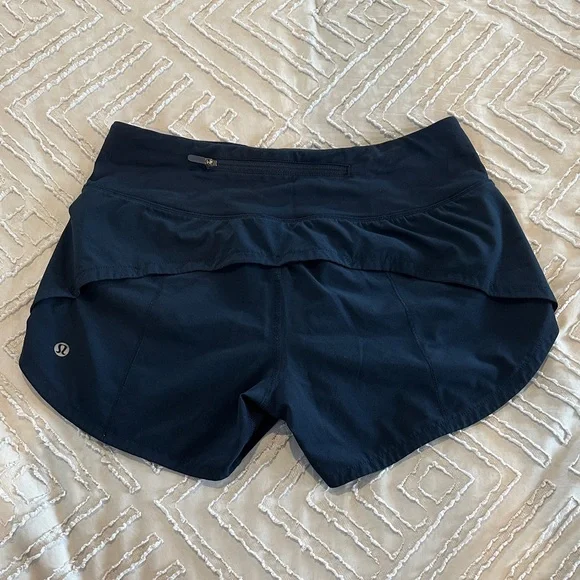 Lululemon Speed Up Mid Rise Lined Shorts 4” in True Navy - Picture 4 of 7